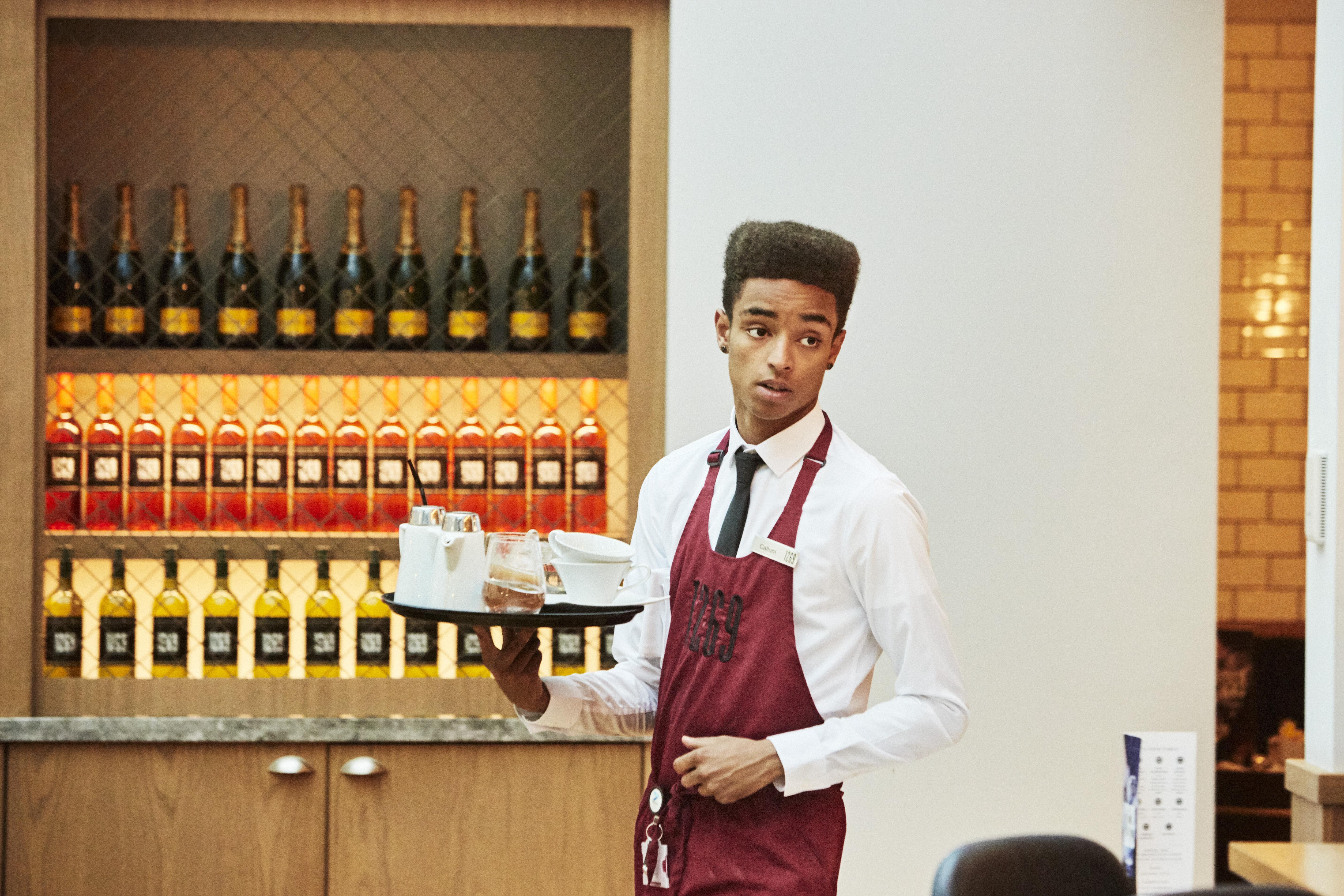 Crowne Plaza Chennai Adyar Park, An Ihg Hotel Экстерьер фото A waiter in a restaurant